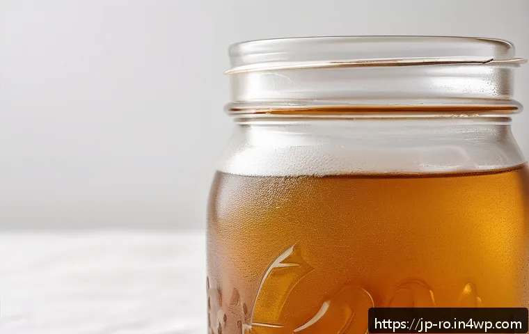 콤부차 가죽의 제조 과정 단계별 설명 - A close-up image of kombucha leather&rsquo;s unique gelatinous membrane texture, showing the translucent, ...