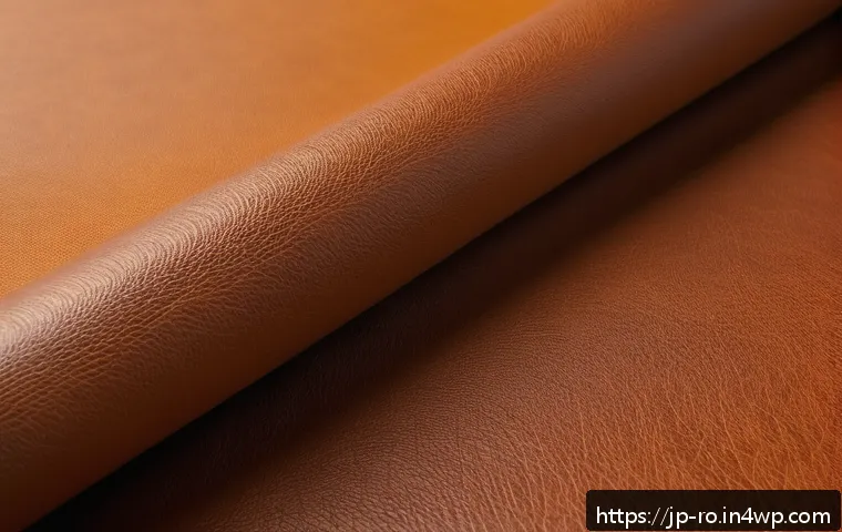 콤부차 가죽 활용한 업사이클링 프로젝트 - A close-up image of kombucha leather texture showcasing its fine cellulose fibers and natural grain,...
